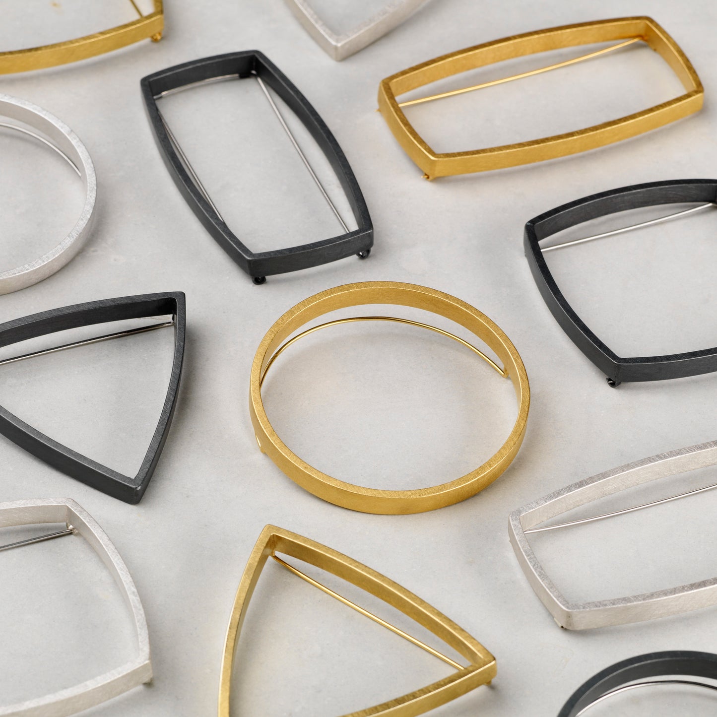 Sheng Zhang - 'Curved Curves' Triangle Brooch