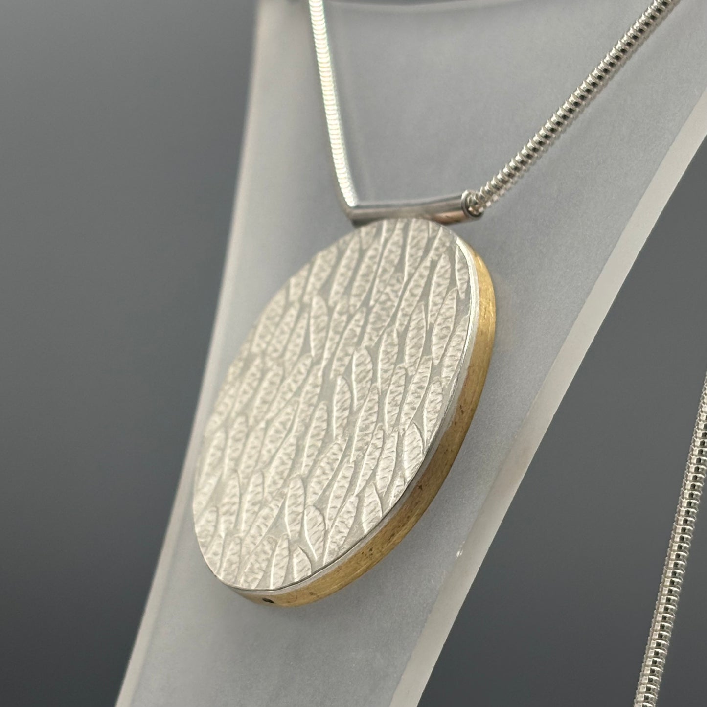 Papermetal – Petals Largest Oval Pendant 18" (Silver/Red Brass Sides & Back)