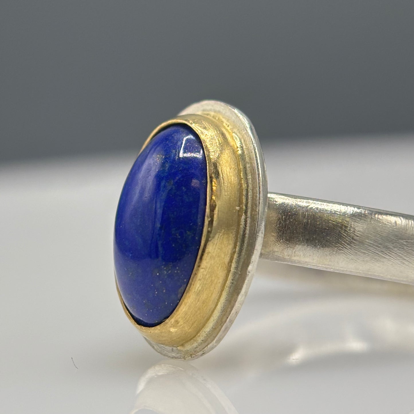 Anthony Feiler – Ring: Lapis Lazuli with 18ct Gold Bezel on Brushed Silver Band