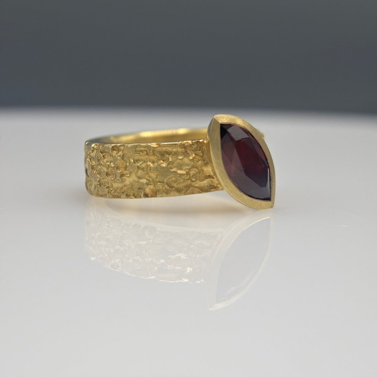 Susi Hines – 18ct Gold Plated Etched Silver Ring with Marquis Garnet